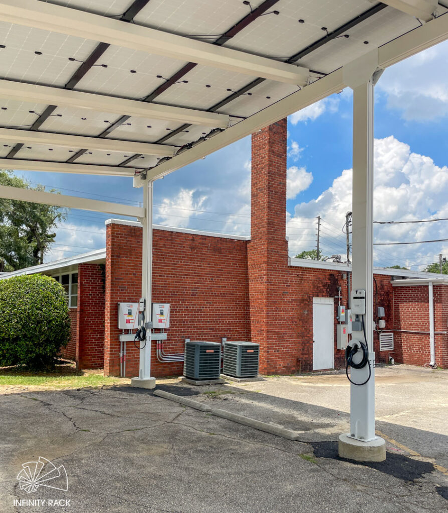 Solar carport with integrated EV charging stations at a Goodwill location