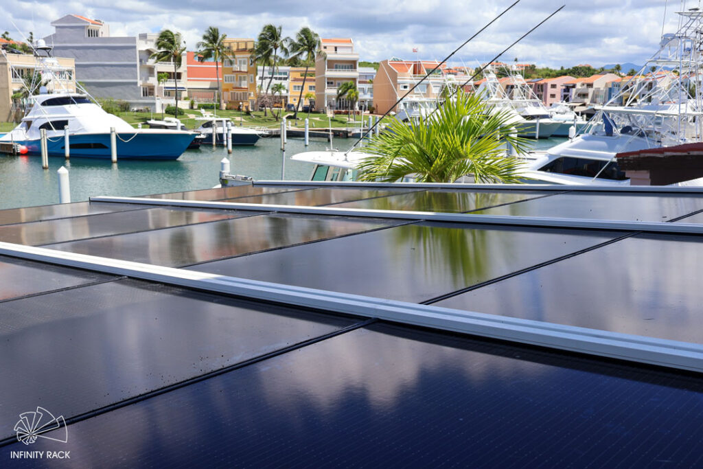 Wall-mounted solar pergola overlooking a waterfront property and marina in Puerto Rico