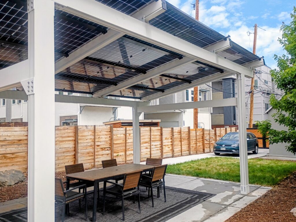 Solar pergola creating a shaded outdoor dining and entertaining space